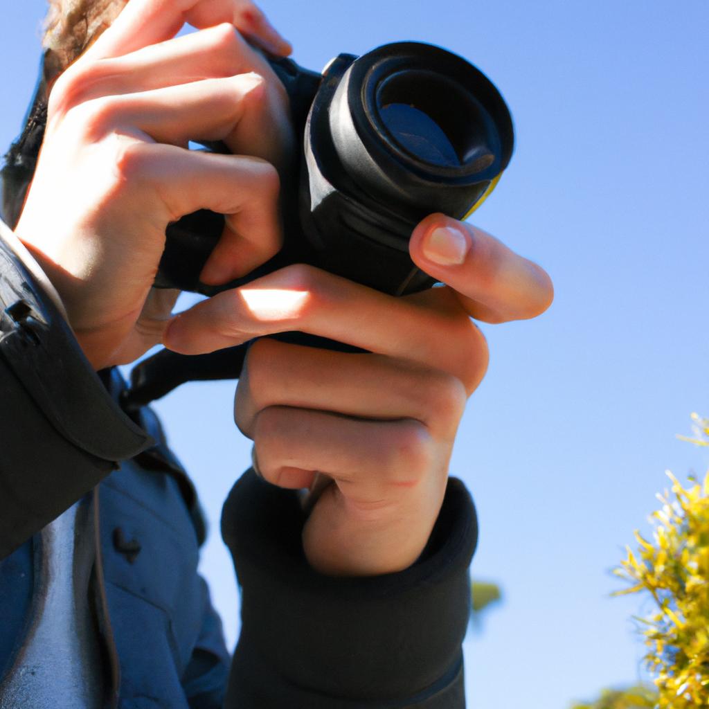 Person holding camera, taking photo