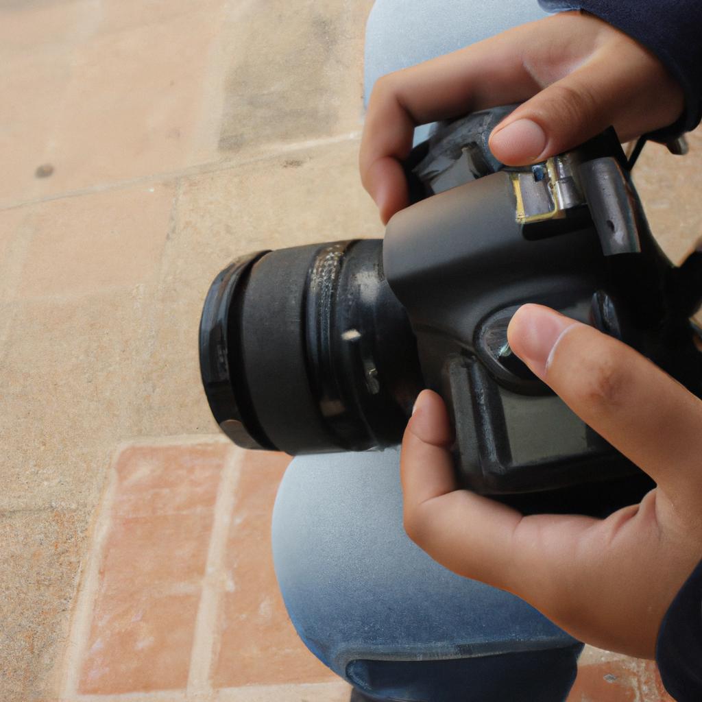 Person holding camera, taking photos